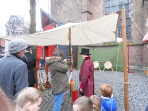 HISTORIE-KS Kasteelschutters Handboogschieten Organisatie Historische Evenementen Charles Dickens Markt Grote Kerk Hofkwartier Geschiedenis Liekie's Liedjes Bas